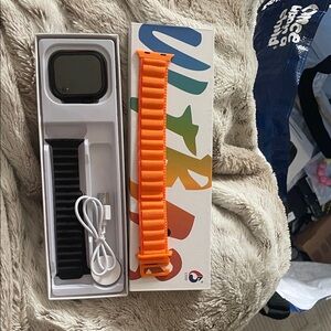 Smartwatch with Black and Orange Bands